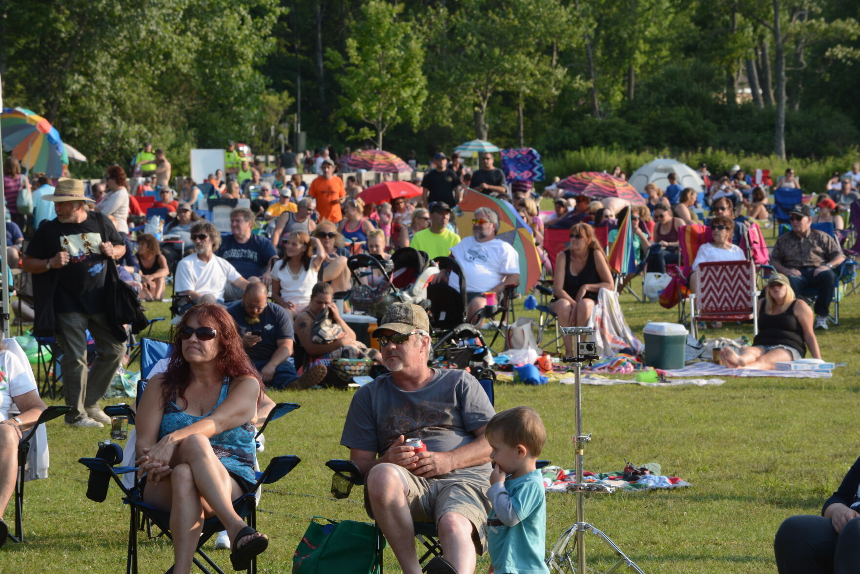 People listen to music at Onota Lake